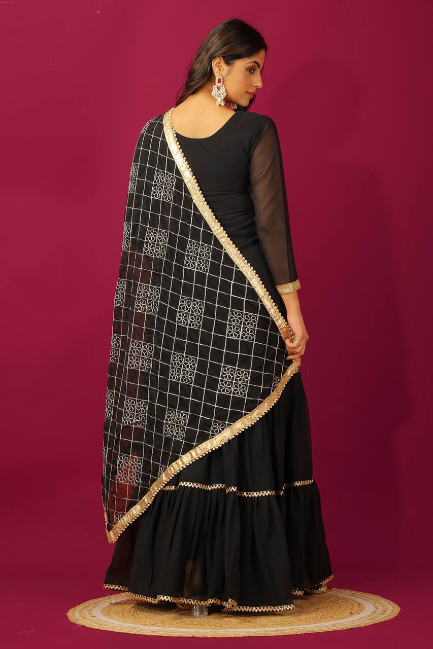 Fashionable Georgette Black Color Sharara Suit