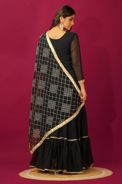 Fashionable Georgette Black Color Sharara Suit