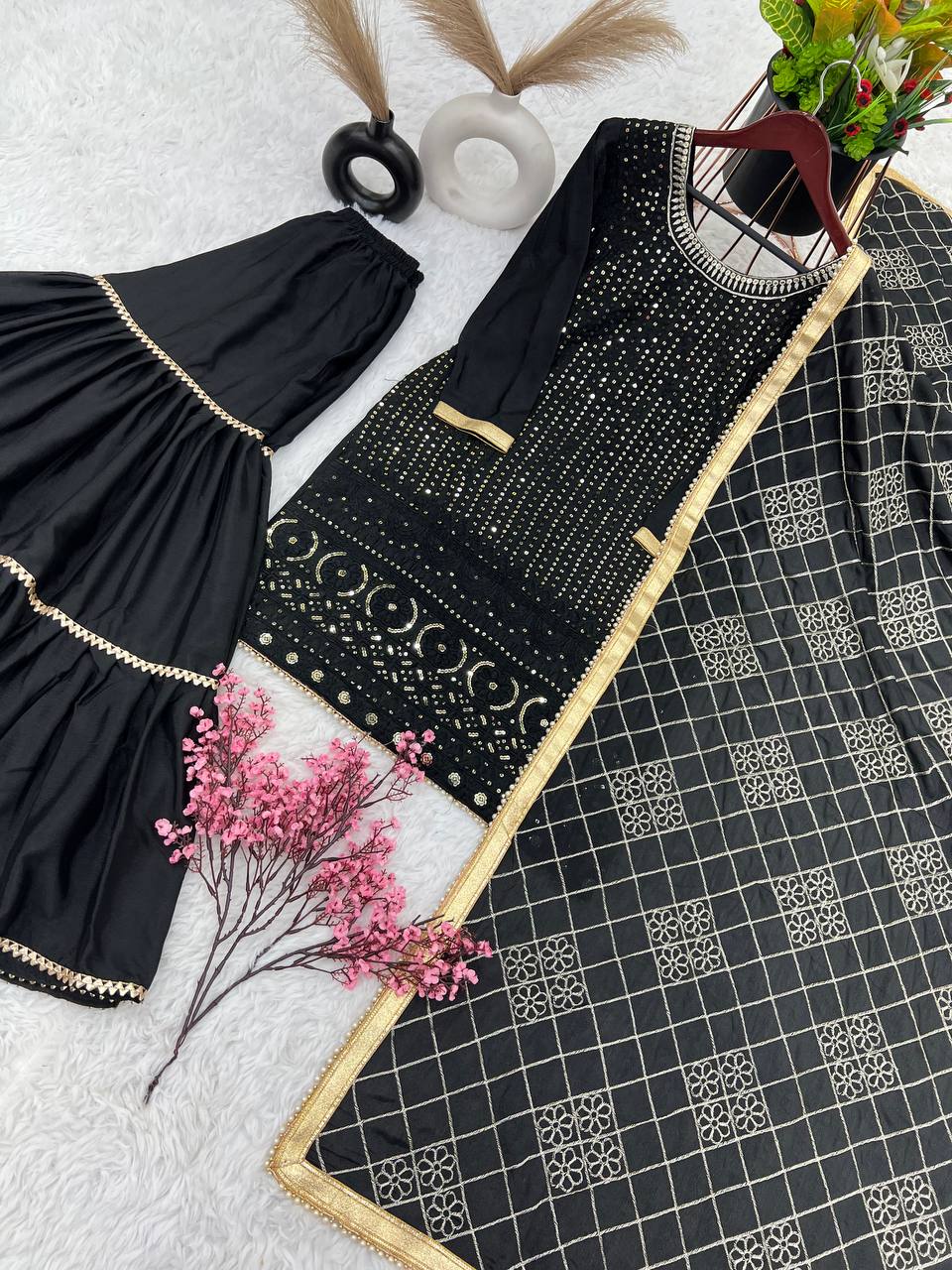 Fashionable Georgette Black Color Sharara Suit