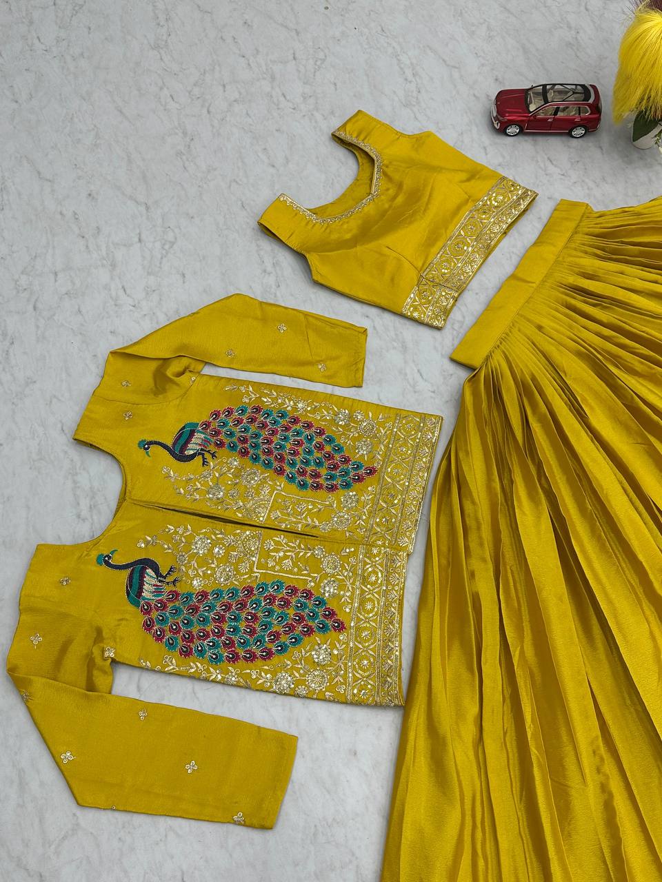 Presenting Chinon Yellow Color Lehenga Choli With Koti