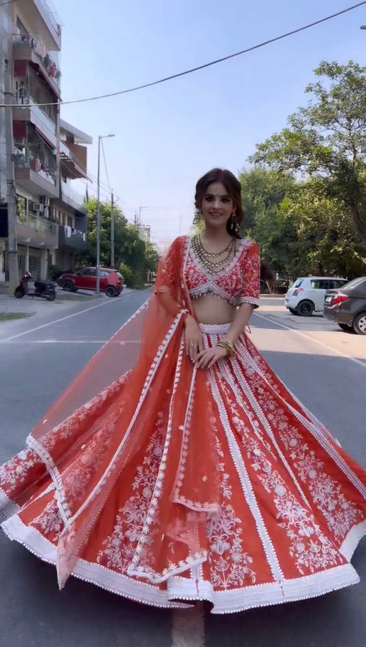 Fabulous Mulmul Silk Orange Color Lehenga Choli