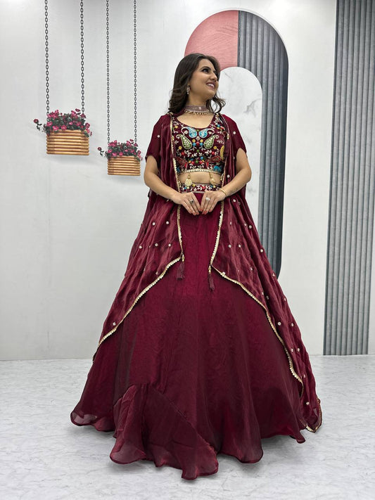 Fancy Embroidery Work Maroon Color Lehenga Choli With Strug