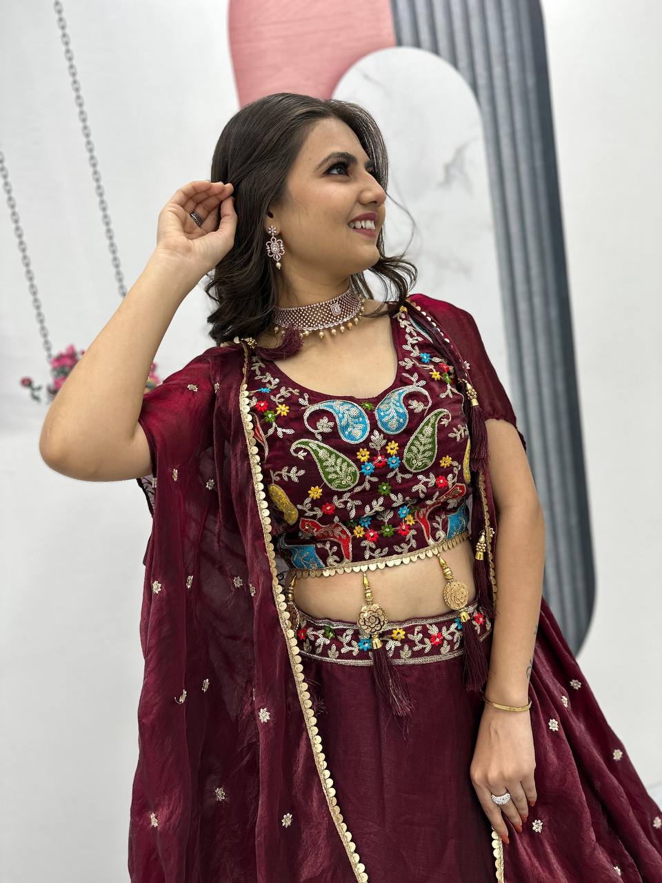 Fancy Embroidery Work Maroon Color Lehenga Choli With Strug