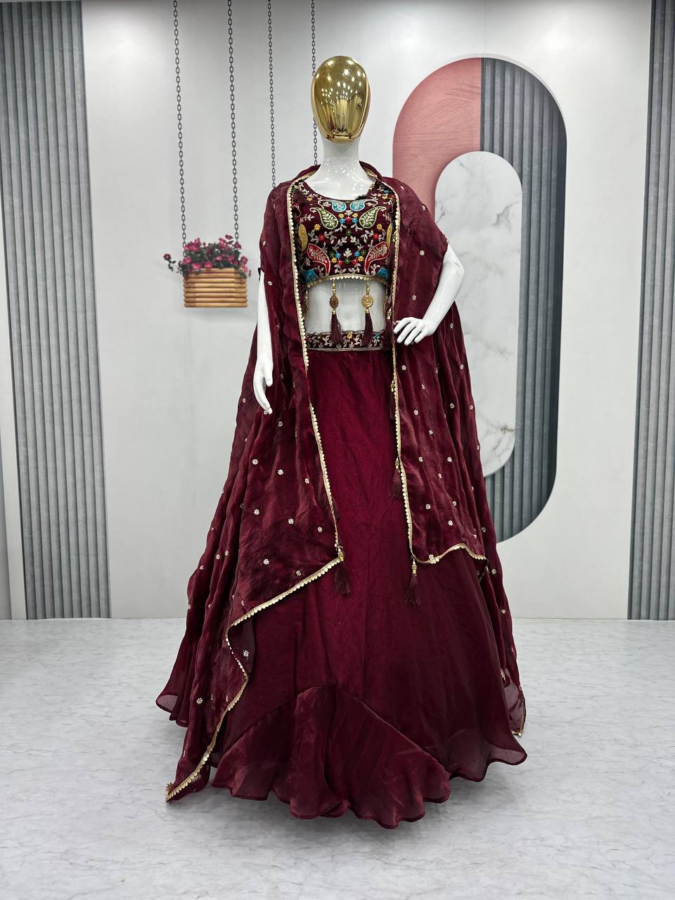 Fancy Embroidery Work Maroon Color Lehenga Choli With Strug