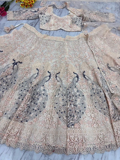 Bridal Wear Heavy Work Cream Color Lehenga Choli