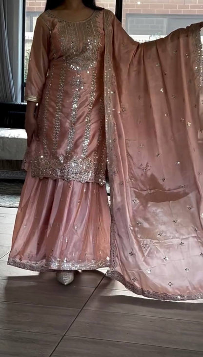 Demanding Embroidery Work Peach Color Sharara Suit
