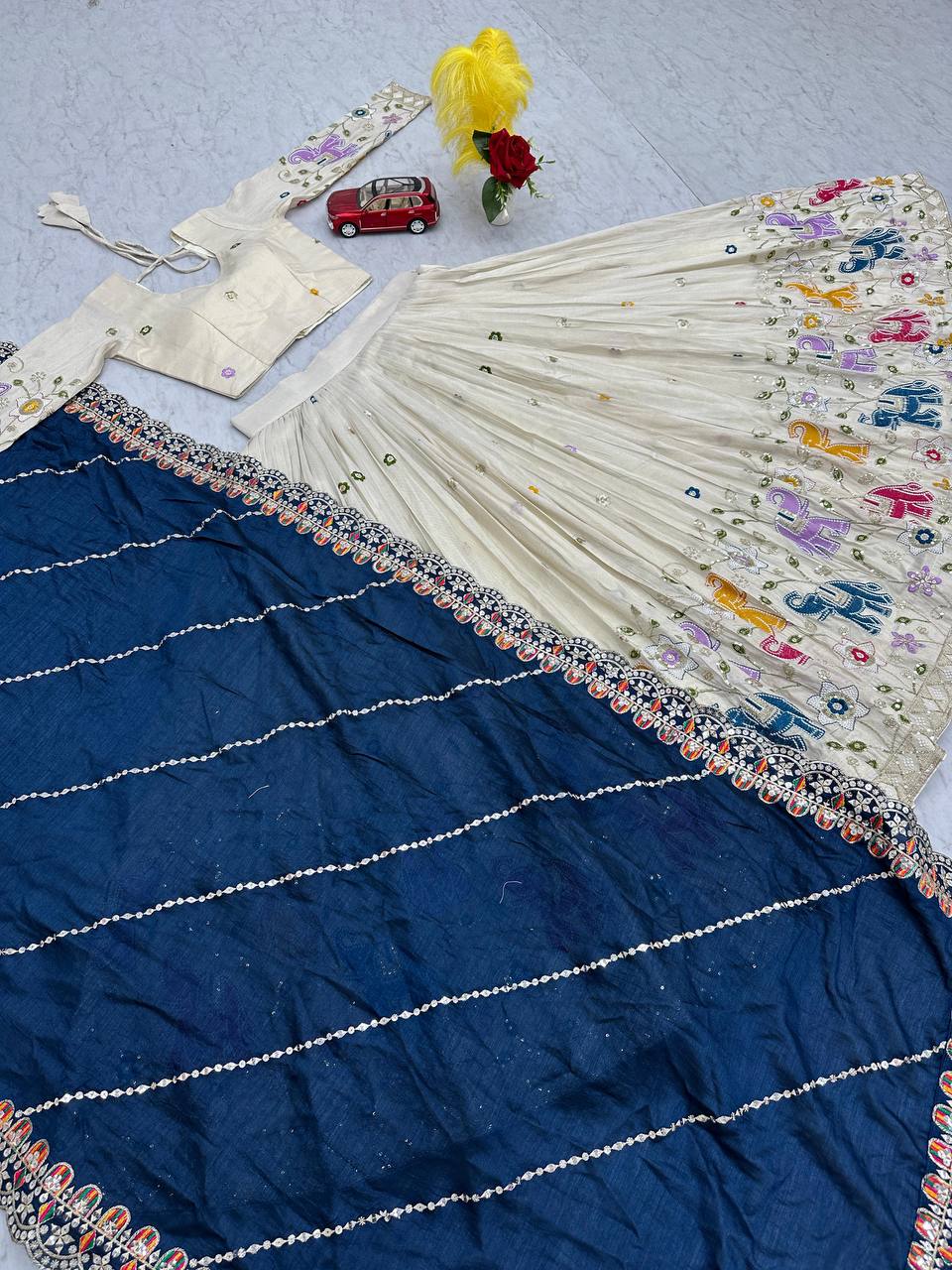 Stunning Off White Color Lehenga choli With Navy Blue Dupatta