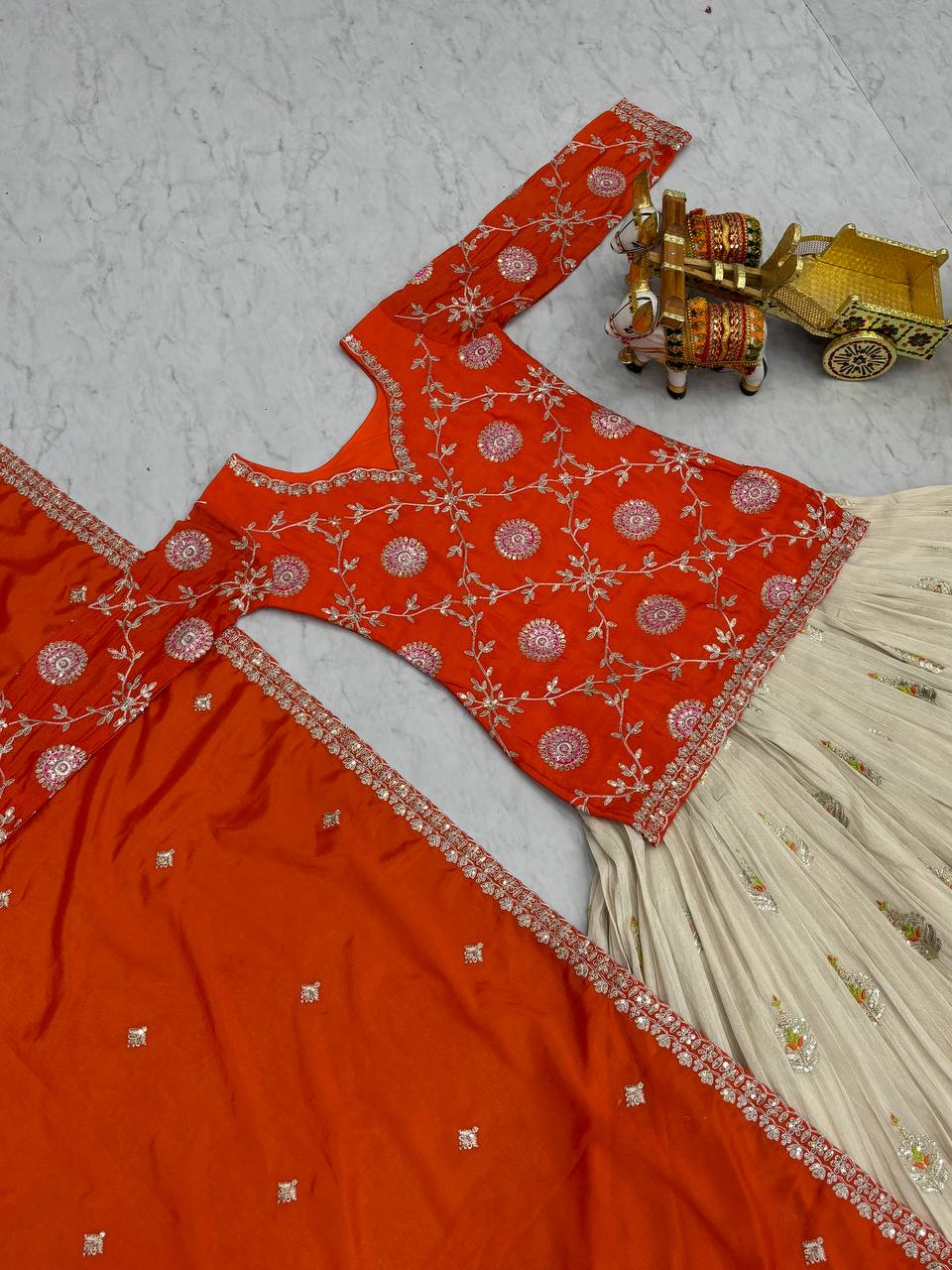 Occasion Wear Orange Color Kurti With White Lehenga