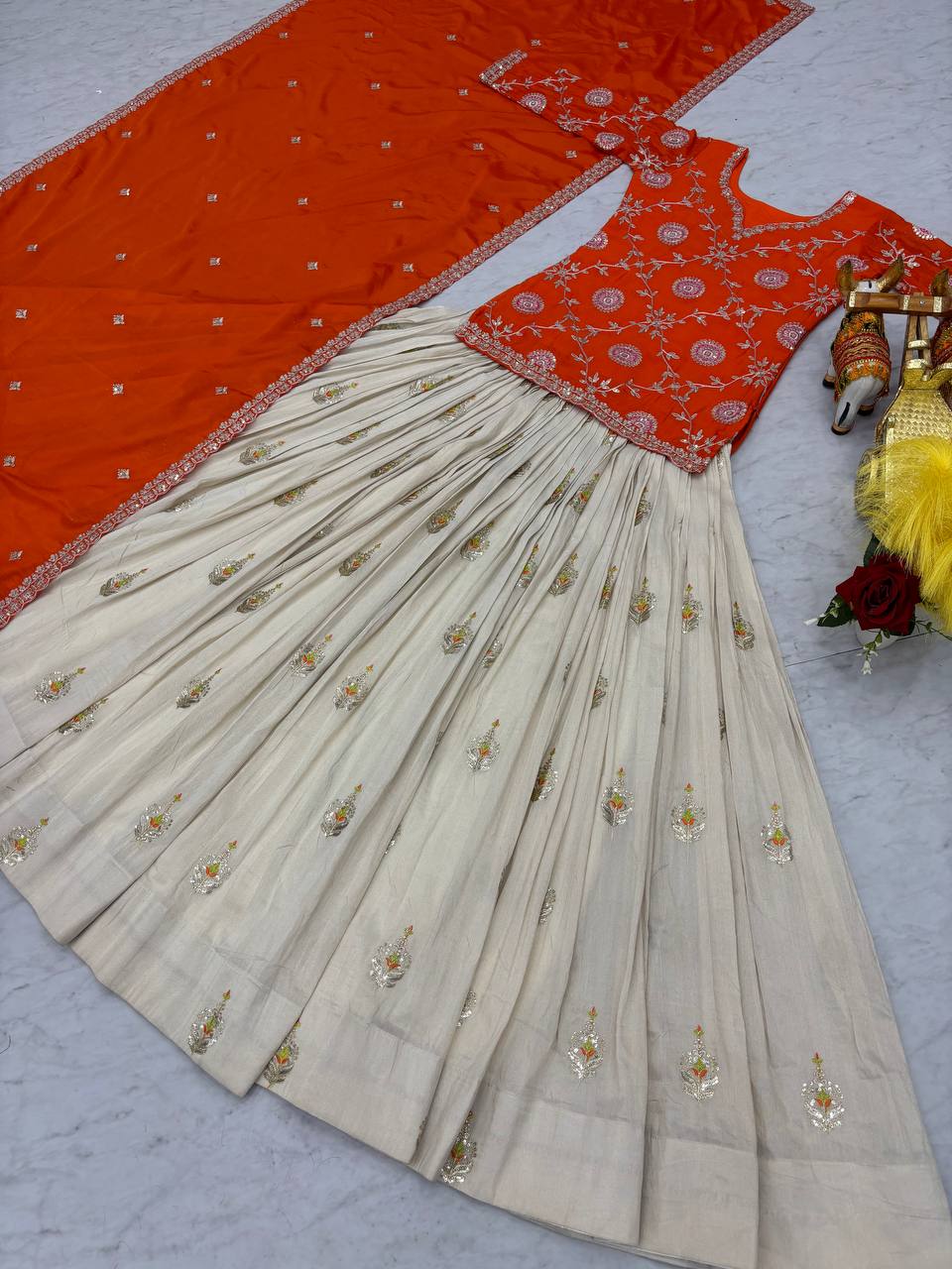 Occasion Wear Orange Color Kurti With White Lehenga