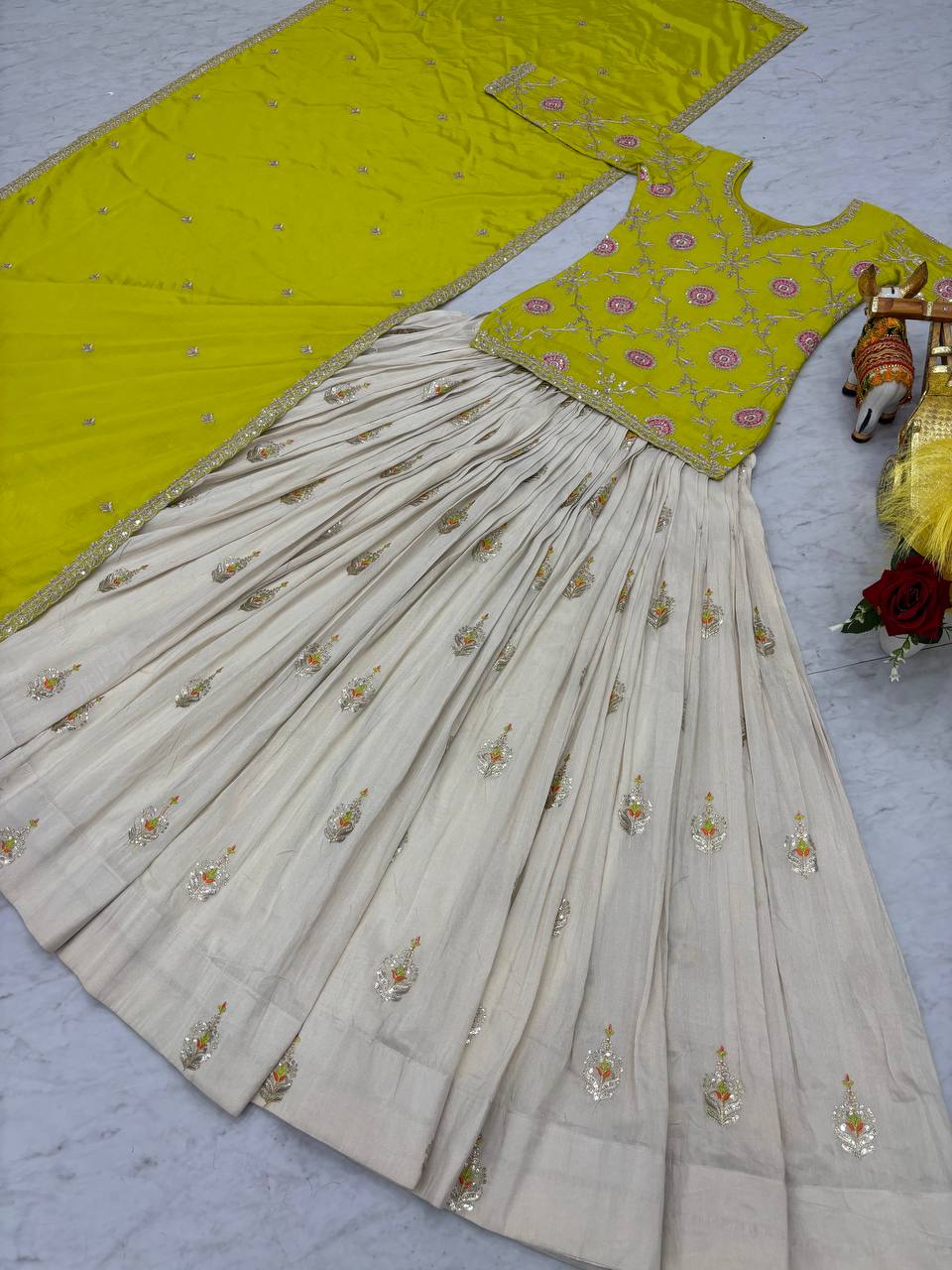 Occasion Wear Green Color Kurti With White Lehenga