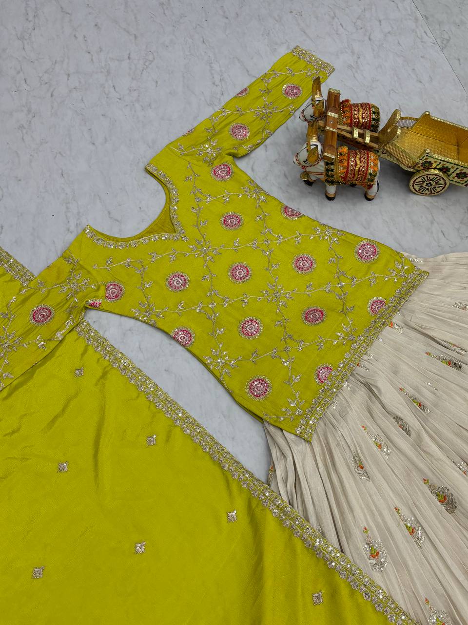 Occasion Wear Green Color Kurti With White Lehenga
