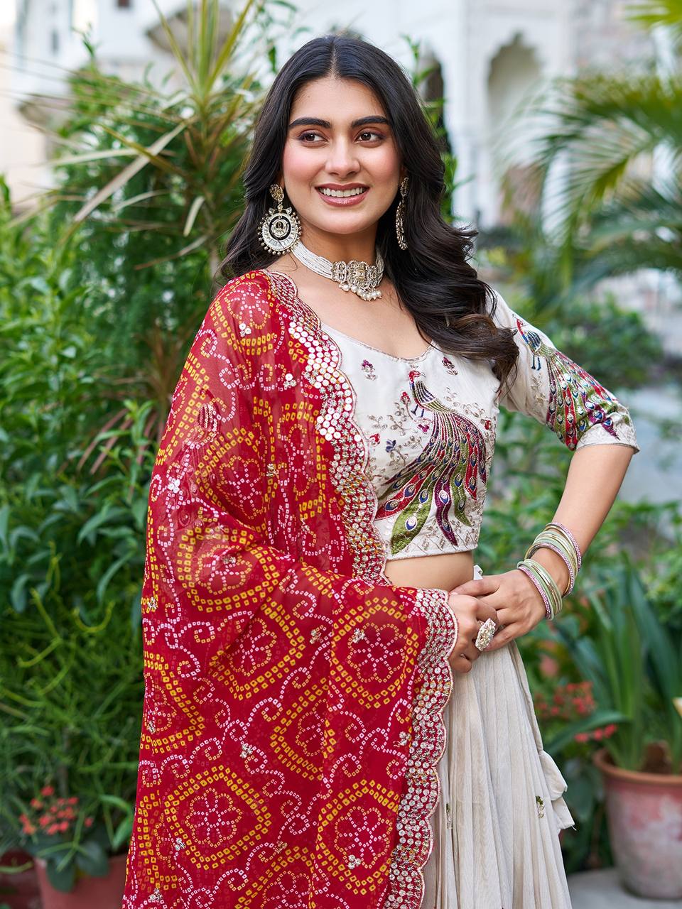 Wonderful Embroidery Work White Color Lehenga With Red Dupatta