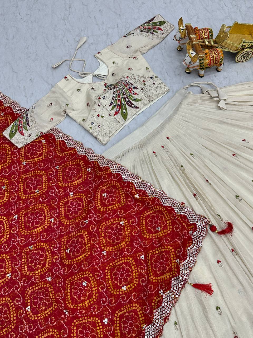 Wonderful Embroidery Work White Color Lehenga With Red Dupatta