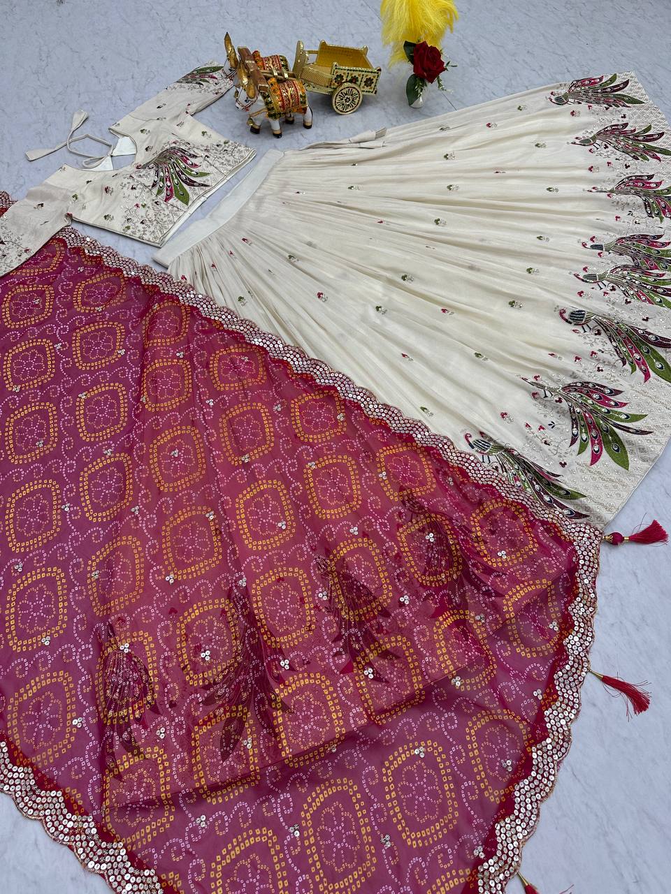 Wonderful Embroidery Work White Color Lehenga With Pink Dupatta