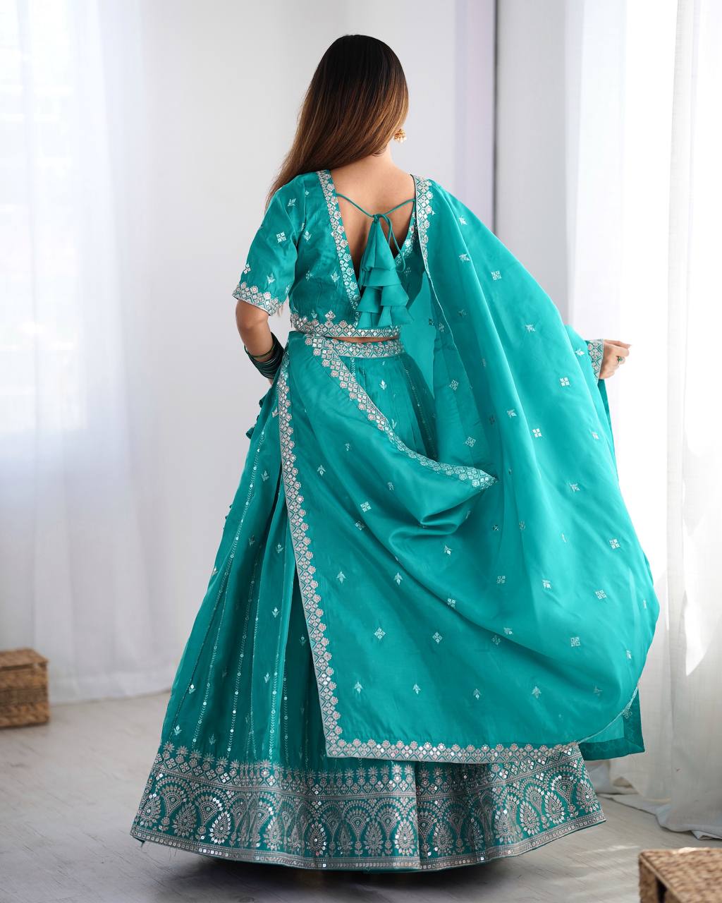 Traditional Wear Sequence Work Rama Color Lehenga Choli