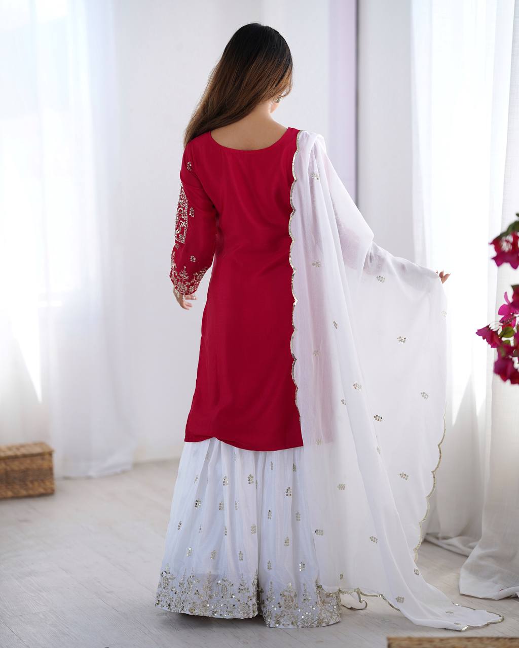 Flattering Embroidery Work Pink Color Sharara Suit