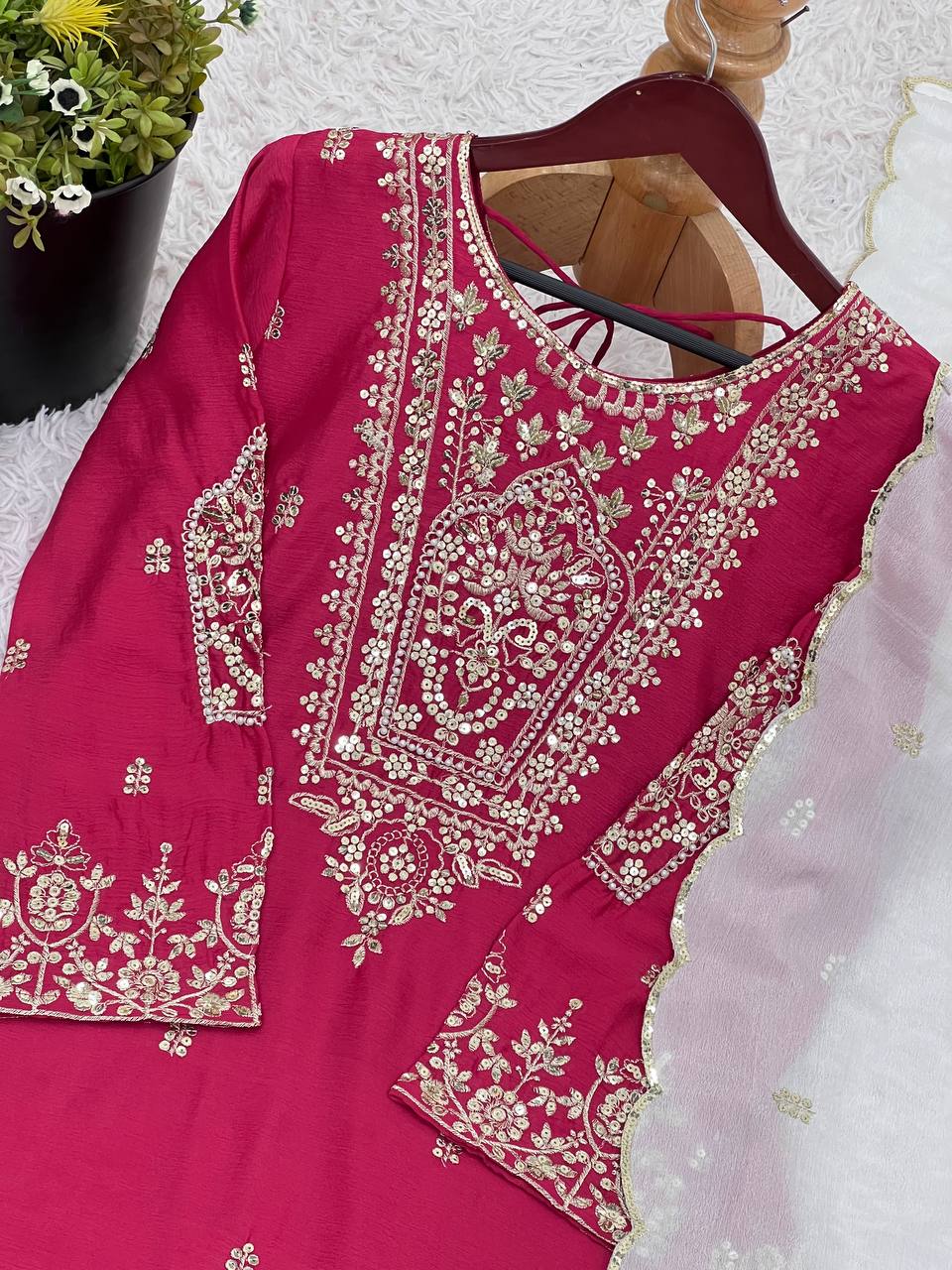 Flattering Embroidery Work Pink Color Sharara Suit