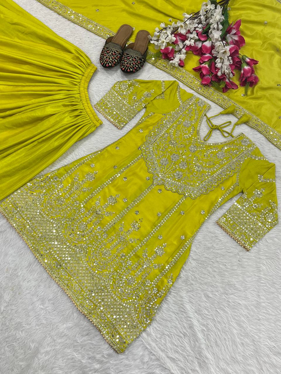 Flattering Yellow Color Heavy Work Sharara Suit