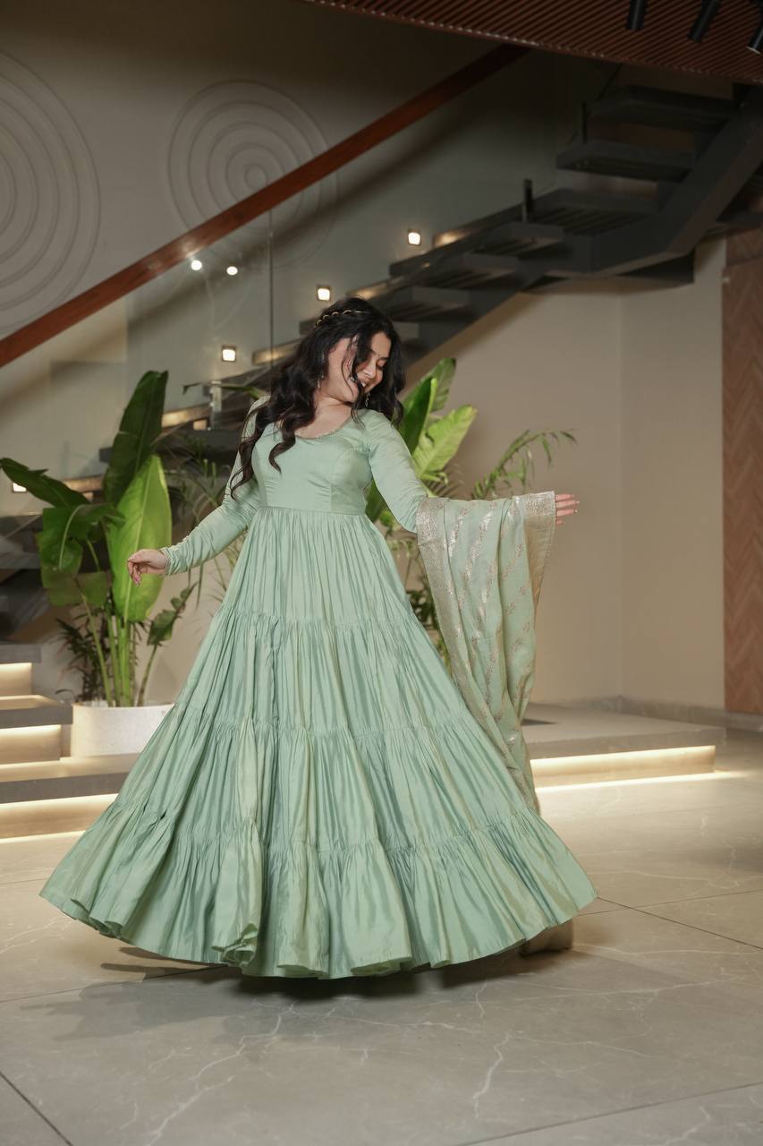 Flattering Roman Silk Pista Color Anarkali Gown