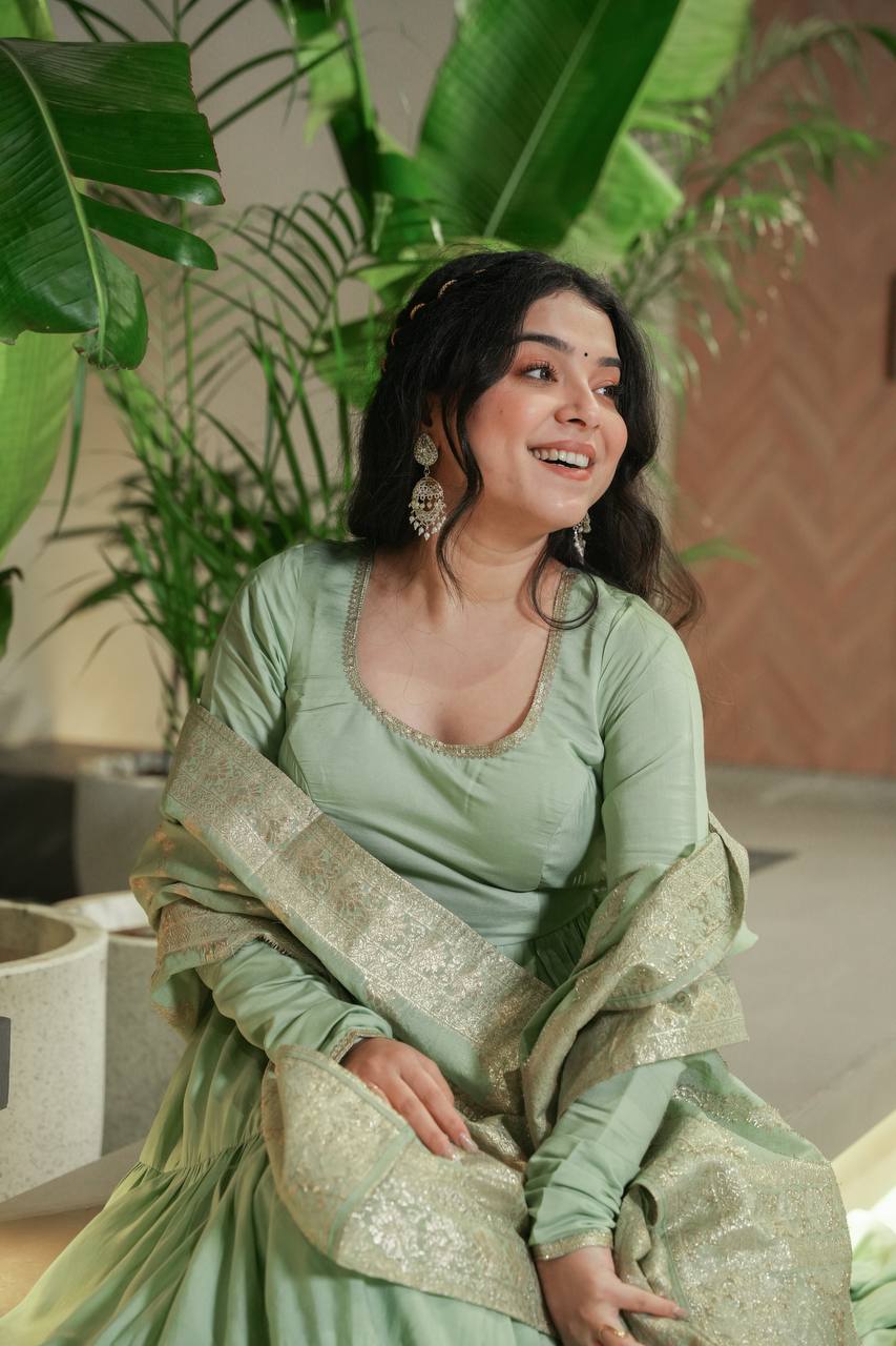 Flattering Roman Silk Pista Color Anarkali Gown