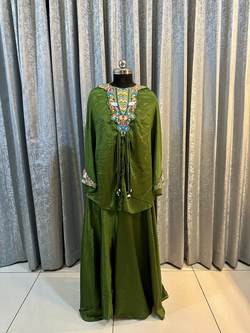 Demanding Embroidery Work Mehndi Color Top With Palazzo Suit