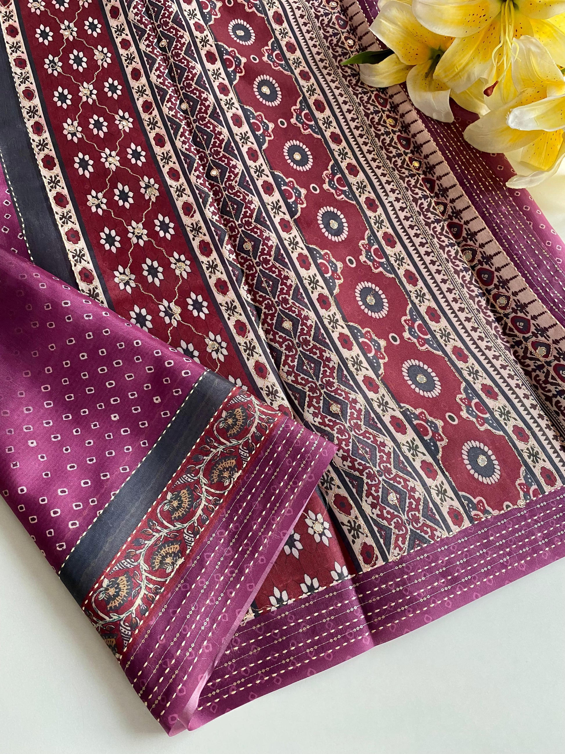 Delightful Bandhani Print With Work Wine Color Saree